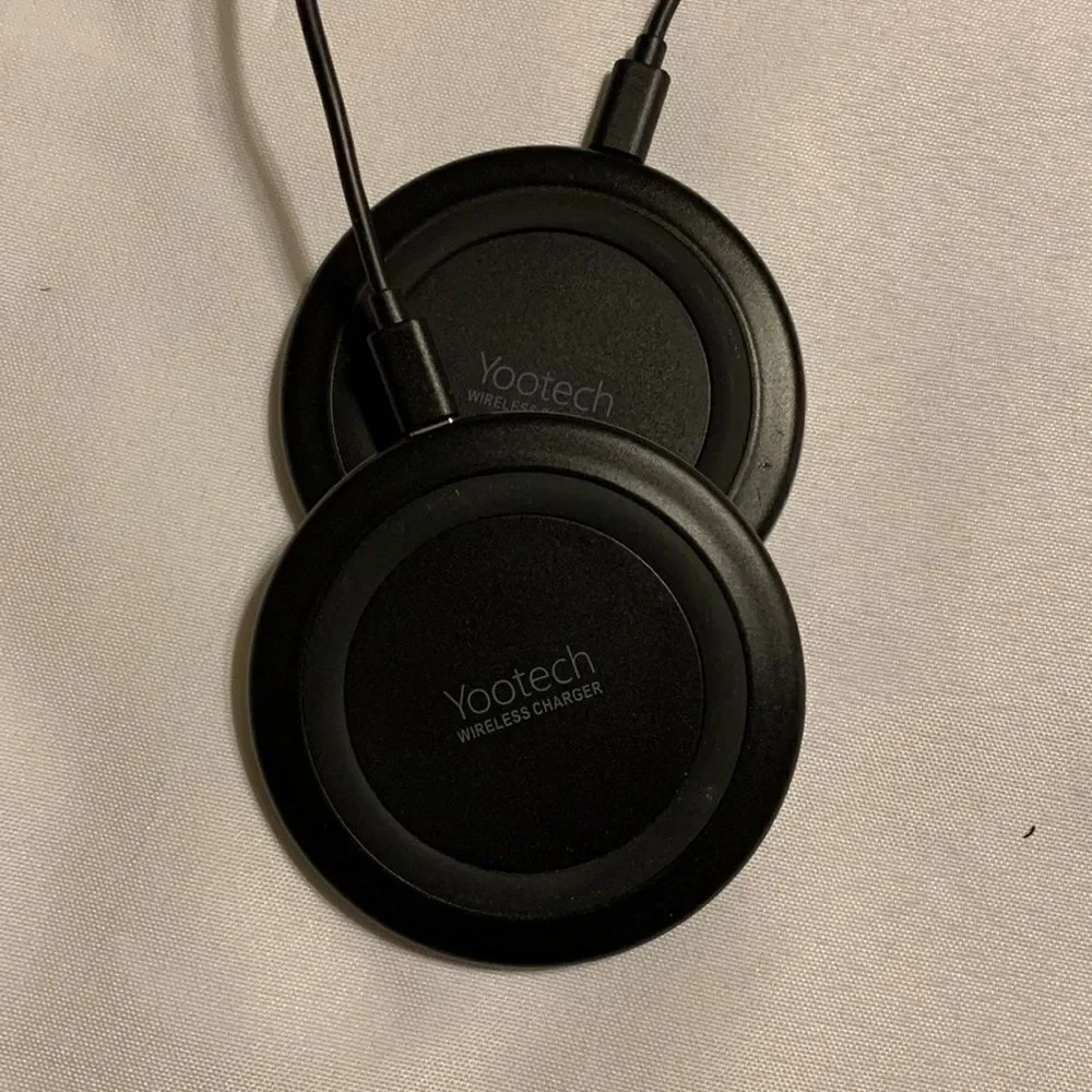 Yootech Set of two wireless chargers. Used one temporary & never the second one